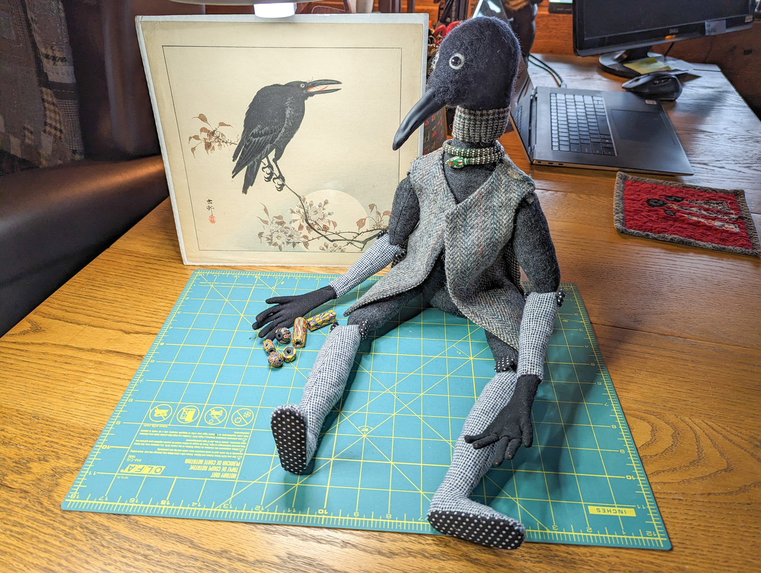 Cotton-stuff cloth doll Edgar, the raven man with a Japanese print of a raven
